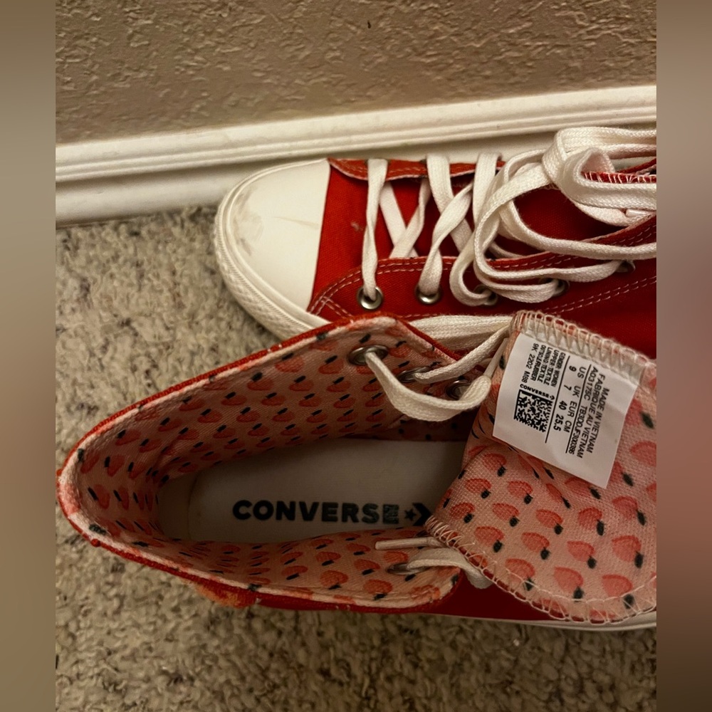 Women’s size 9 orange converse with peach embroidery and detail